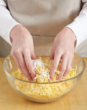 To prevent clumping and a grainy soup texture, toss the shredded cheeses with a little cornstarch.