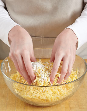 To prevent clumping and a grainy soup texture, toss the shredded cheeses with a little cornstarch.