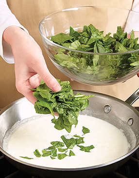 It might look like you’re adding a lot of spinach, but it cooks down very quickly, so be sure to use all of it.