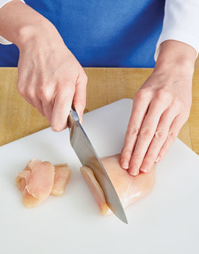 So the chicken absorbs more of the marinade, and cooks quickly, cut the breasts into thin strips.