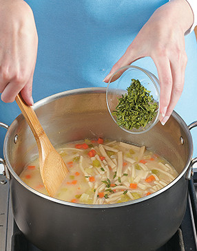 Stir in the fresh herbs at the end of cooking to keep their flavors and color fresh.