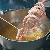 Use a skewer to add and remove rings from oil. Drain fried onion rings on a paper-towel-lined plate.
