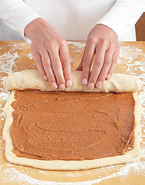 Roll up the dough jelly roll-style, starting on the short side. Freeze logs briefly for easier cutting.