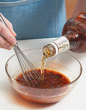 Whisk whiskey with preserves and chipotles. Reserve half of the glaze to serve with the steak.