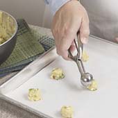 Drop dough onto baking sheets; bake until dry and golden. (May be baked, frozen, and reheated at 350&deg; until crisp.)