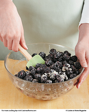 Gently stir the filling together to evenly distribute the tapioca without damaging the berries.