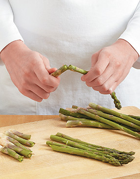Asparagus has fibrous ends. To remove the tough ends, just snap the spear where it naturally breaks.