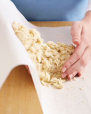 using parchment paper to fold flaky pie crust dough