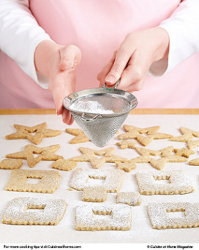 Wait until cookies cool completely before sprinkling with powdered sugar so it doesn’t melt.