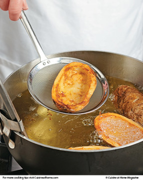 Deep-frying the potato skins until golden brown makes the base for these potatoes crunchy and sturdy.
