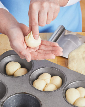 Shaping milk bread dough for clover leaf rolls