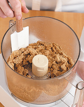 Once the butter is added, process the wafer crumbs just until the mixture begins to cling together.