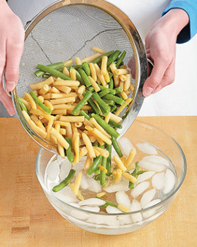 To prevent overcooking, shock the beans in a bowl of ice water as soon as they're blanched.