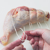 Secure the stuffed hindquarters with butcher's twine; use a tightly cinched double knot, which won&rsquo;t loosen.
