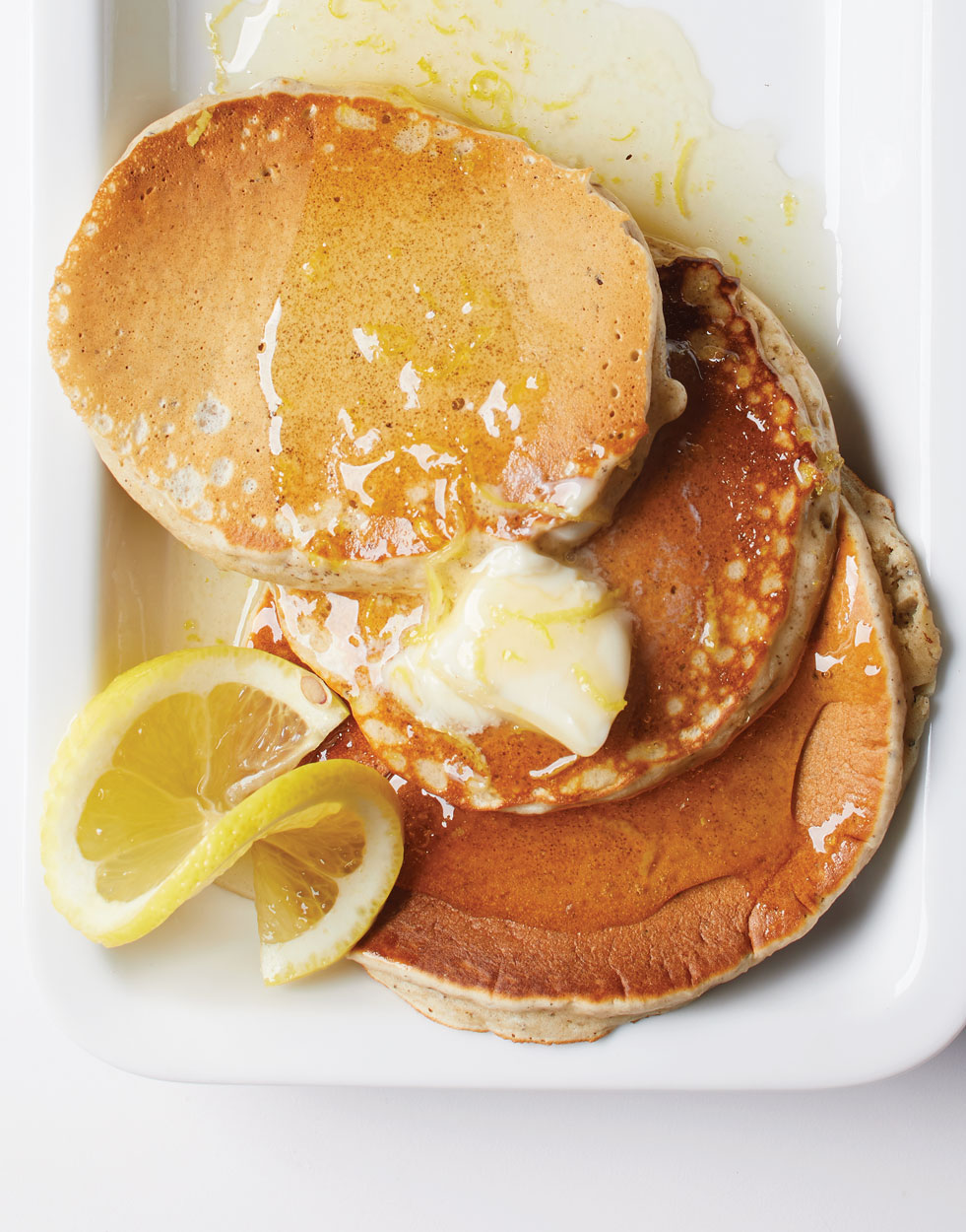 Black Pepper Ricotta Pancakes with lemonade glaze