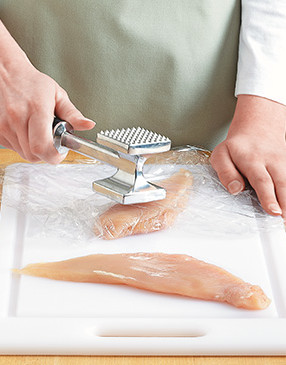With the flat side of a mallet, pound chicken breasts to &frac14;-inch thick between sheets of plastic wrap or in a resealable plastic bag.