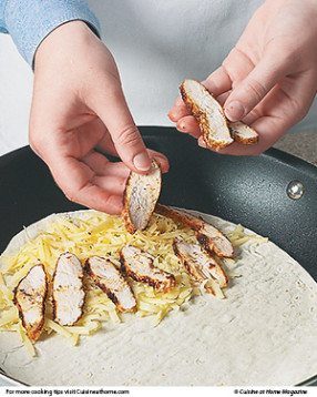 Cook two quesadillas at a time until golden brown on both sides, flipping carefully with a spatula.