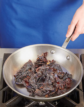 Toast the chiles before adding them to the slow cooker. The heat releases their oils for more flavor.