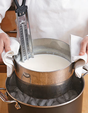 Milk cools fastest in an ice bath, but cooling at room temperature, stirring periodically, works too.