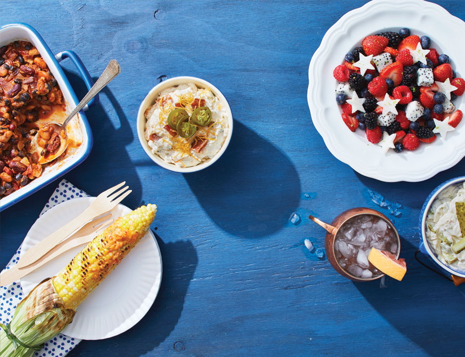 4th of July side dishes: Firecracker Beans; Red, White, and Blue Fruit Salad; grilled corn with Pimento Cheese Butter; and Bacon