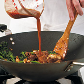 Stir in the reserved marinade. After cooking briefly, the marinade will thicken into a savory sauce.