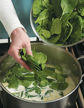 Because the heat from the soup wilts the spinach so quickly, add it just before serving. 