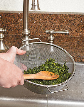 To remove water from thawed spinach, press it through a sieve, a ricer, or squeeze with your hands.