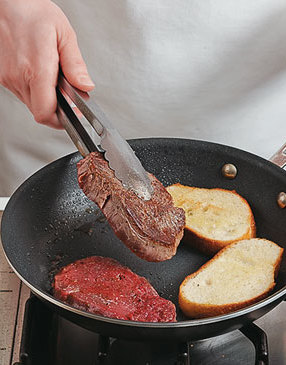 Cook steaks and bread together in the same skillet. Keep an eye on the bread as it may cook quicker.