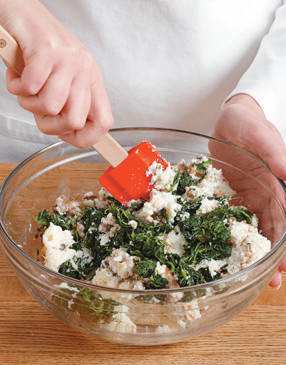 After blending the cheese and egg, add the mushroom mixture and spinach.