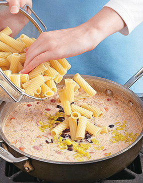 Add the rigatoni to the sauce, stirring to heat through and to coat the pasta with the sauce.