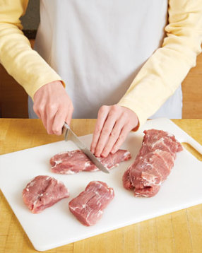 After trimming the pork, cut it into large uniform-sized chunks so it cooks evenly and more quickly.