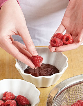 For freshness, add a layer of whole raspberries in the middle of the brownie cups.