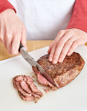 For tenderness and to make it easier to eat, slice the steak as thinly as possible. 