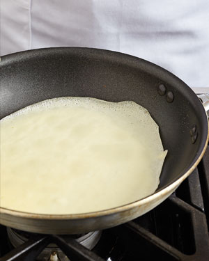 Cook each crêpe until the edges are golden and lacy, and the bottom is lightly browned. 