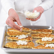 Crumble mozzarella over each cutlet. Place cutlets in the oven to finish cooking and to melt the cheese.