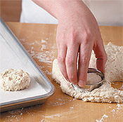 Pull cutter up, without twisting, as you remove. Twisting prevents the biscuits from rising as they should.