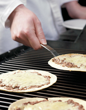 Heat tortillas until cheese melts. Tortillas should remain pliable enough to fold without breaking.