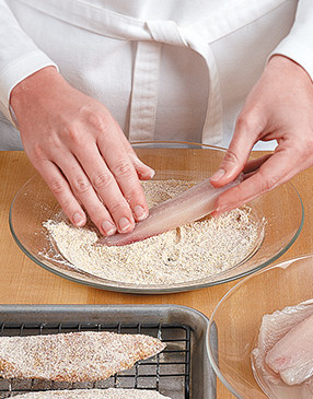 Dredge both sides of marinated tilapia in flour mixture; place on a wire rack until all are coated.