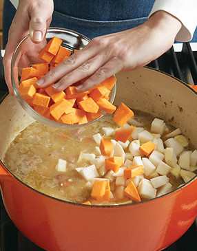 To avoid overcooking the root vegetables, add them after the meat simmers for 30 minutes.