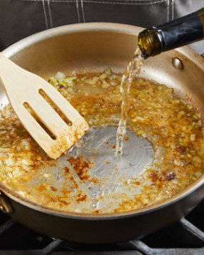 The key to a deeply flavored sauce is deglazing. The wine loosens the fond on the bottom of the pan, enabling you to scrape it up. As the fond dissolves, it adds flavor and color to the sauce.