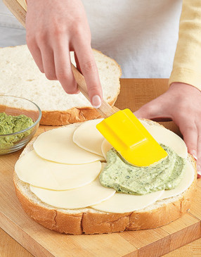 It may seem like a lot of pesto mayonnaise, but be sure to spread all of it on top of the provolone.