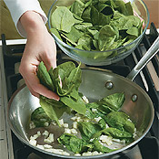Saut&eacute; the onion, then add spinach by the handful to wilt. Stir in the ham, chives, and pepper flakes.