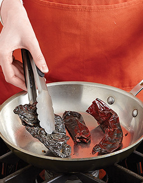 To intensify the flavors of the dried chiles, toast them in a hot skillet just until fragrant.