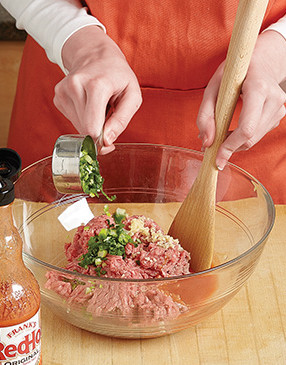 Mix burger ingredients in a large bowl for even distribution. For best results, finely mince the scallions. 