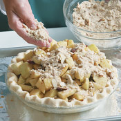 Sprinkle the assembled pie with all of the streusel topping. Bake for about 1 hour.
