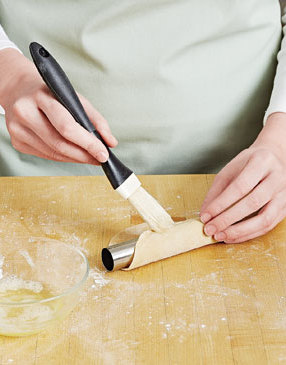 When sealing the dough with egg white, make sure you don’t get any on the form or shells won’t release.
