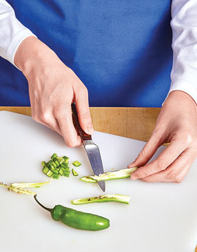 Seeding and removing ribs of serrano peppers for Instant Pot butter chicken