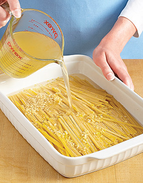 Be sure to submerge the pasta in the broth and water and stir it with a fork to keep it from clumping.
