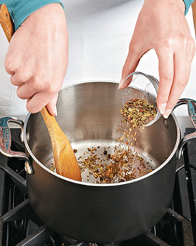 To release oils and intensify flavors, toast the spices and caraway seeds, stirring them so they don't scorch.