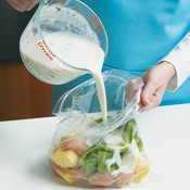 Marinate the chicken, pineapple, and pepper in half the coconut mixture. Use the rest for basting.